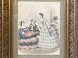 an old picture of a woman in a dress with two other women