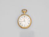 an antique gold pocket watch with roman numerals and roman numerals on the dial