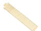 a close up of a gold bracelet on a white background