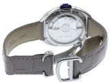 the watch has a silver case and a black leather strap