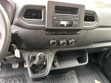 a dashboard of a car with a steering control