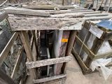 a pile of junk in a building with a broken door
