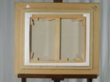 a picture of an easel with a painting on it