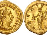 a gold coin with an image of a man holding a sword