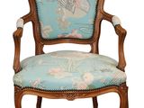 an image of a chair with a blue upholstered seat