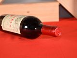 a bottle of wine that is sitting on a table