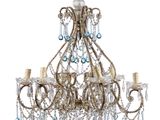 a close up of a chandelier with blue glass beads