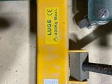a close up of a clamp with a wren on it