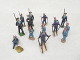 many figurines of men dressed in blue uniforms
