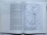 an open book with a map of the world on it