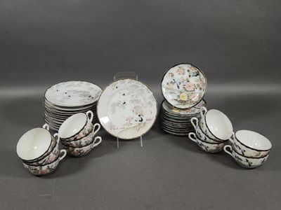 a lot of plates and cups on the table