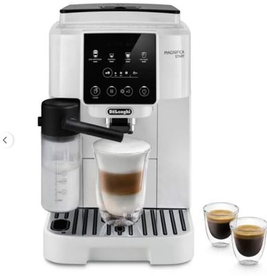 a white coffee machine sitting next to two cups of coffee