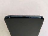 the back of a black iphone with the camera facing towards the camera