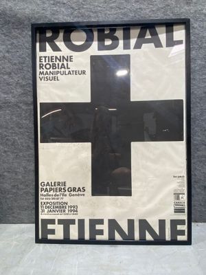 a black and white photo of a magazine cover with a cross on it