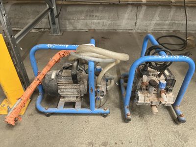 two machines that are sitting next to each other