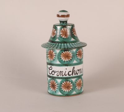 an image of a ceramic jar with the word cornichum written on it