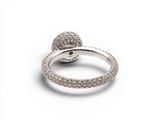 a close up of a ring with a snake on top of it