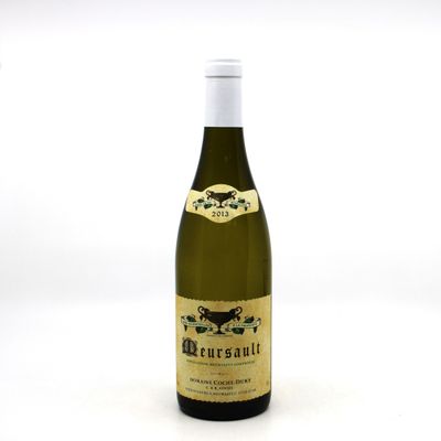 a bottle of wine that is sitting on a table