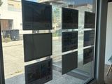 a large window that has a bunch of pictures on it