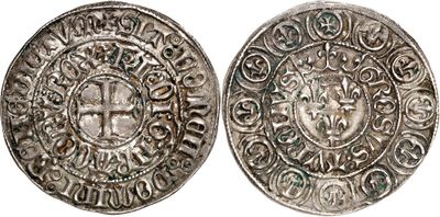 a silver coin with an image of a man on it