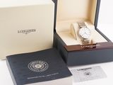 a watch that is in a box on the table