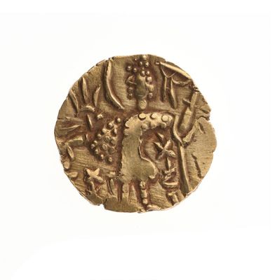 une image représentant une pièce d'or sur laquelle figure le portrait d'un homme