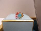 a ring that is sitting on top of a box