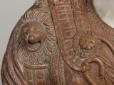 a statue of a woman with a crown on it ' s head