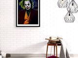 the joker painting is hanging on the wall in the living room