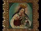 an old painting of a woman holding a child in a gold frame