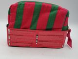 red and green striped toilet bag with zipper closure