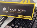 a box on top of a computer keyboard on a desk