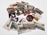 an old photo of a bunch of old photos on a table
