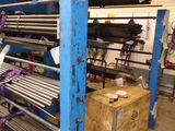 a machine that is sitting in a room with a lot of items on it