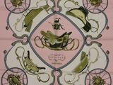 a square scarf with a picture of a horse and carriage on it