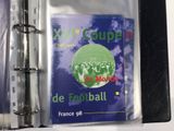 a binder with a picture of a soccer game on it