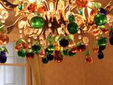 a colorful chandelier hanging from the ceiling in a room