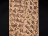 an old photo of a brown and white painting on a black background