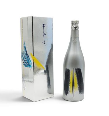 a bottle of wine that is next to a box