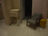 a chair and a table in a small room
