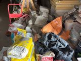 many items that are sitting on a table in a warehouse