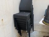 two chairs and a table in a corner of a room