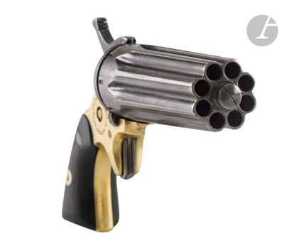 the gun is made out of metal and has a wooden handle