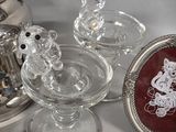 a lot of glass items that are on a table