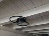 a ceiling fan hanging from the ceiling in a room