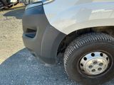 a close up of a flat tire on a truck