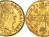 a gold sovereign coin with a cross on the front and a crown on the back