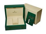a close up of a box with a watch inside of it