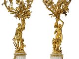 pair of gilet candlesticks in the style of louis xvi
