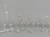 a lot of glass items that are sitting on a table